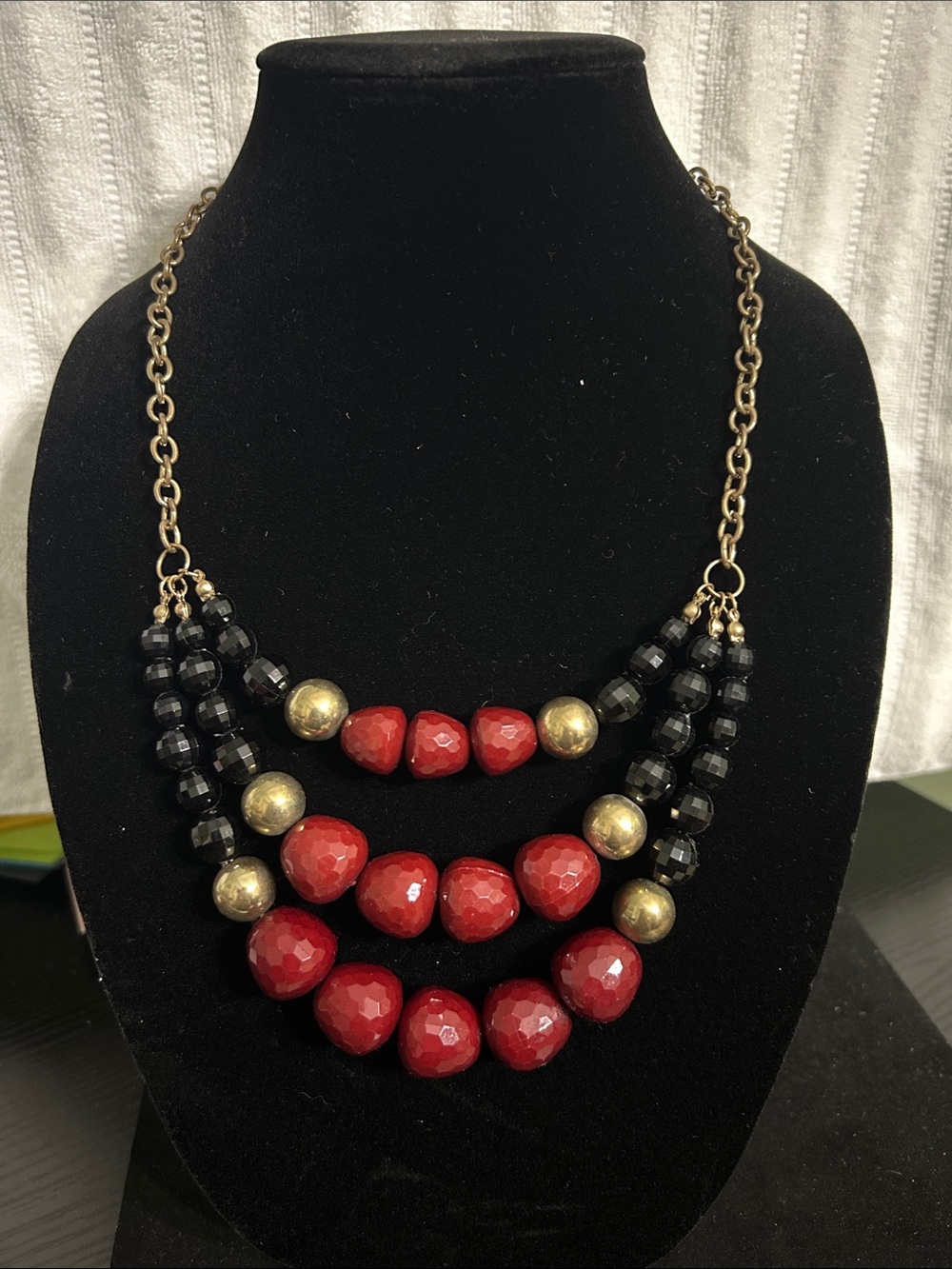 Layered Red Bead Statement Necklace with Black and Gold Accents